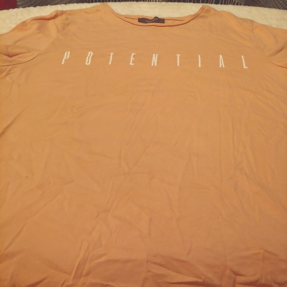 Pale peach potential tee